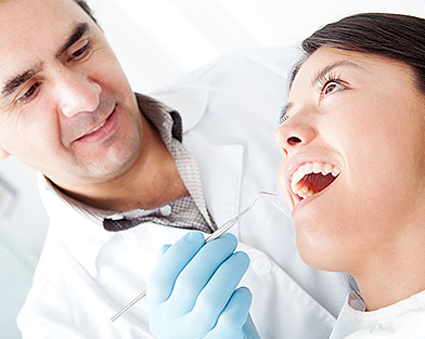 Dentists and Patient working on oral care